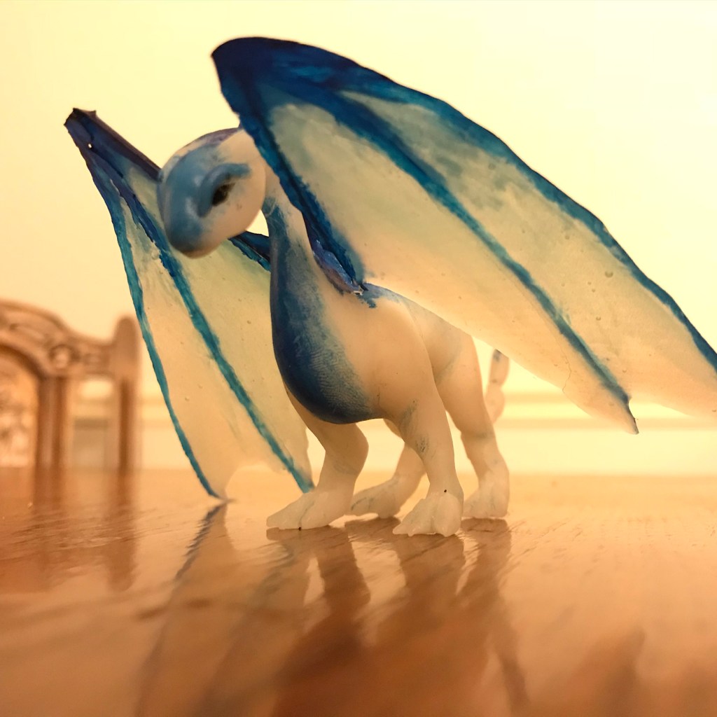 Icy transparent, white and blue dragon